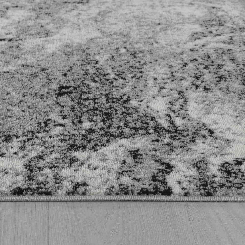 4' X 6' Gray And Black Abstract Distressed Area Rug