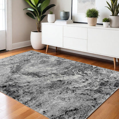4' X 6' Gray And Black Abstract Distressed Area Rug