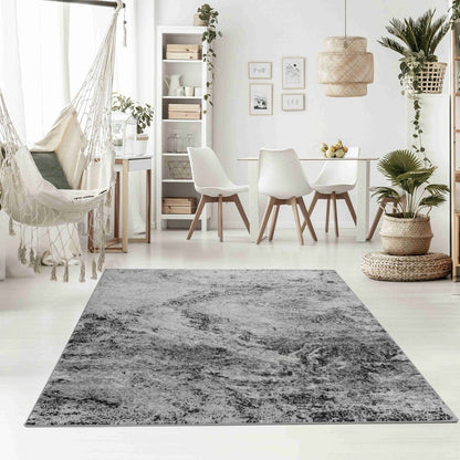 5' X 7' Gray And Black Abstract Distressed Area Rug