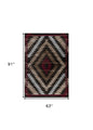 5' X 7' Brown And Red Geometric Area Rug