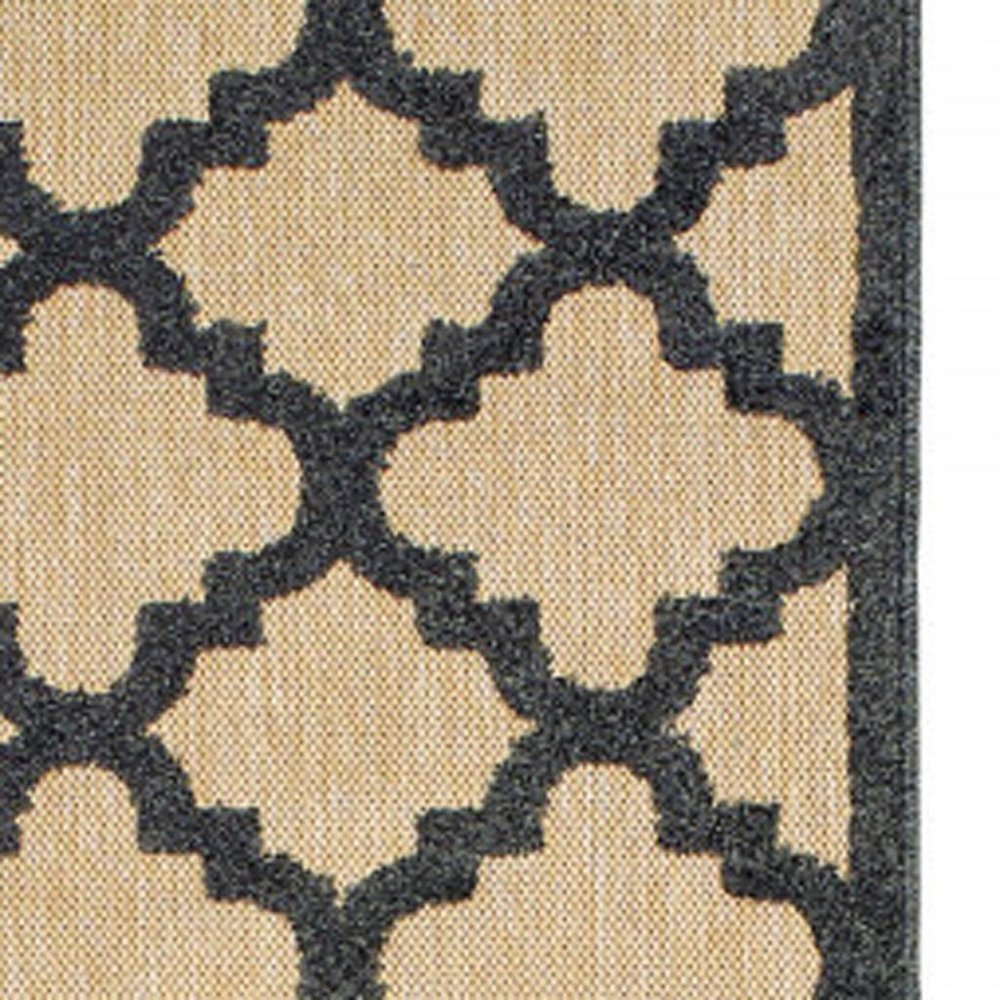 2' X 8' Beige and Black Geometric Stain Resistant Indoor Outdoor Area Rug