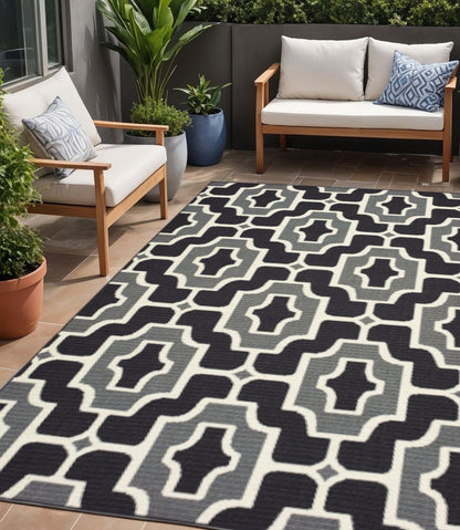 5' X 8' Black and Gray Geometric Stain Resistant Indoor Outdoor Area Rug