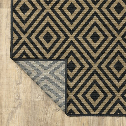 2' X 4' Black and Tan Geometric Stain Resistant Indoor Outdoor Area Rug