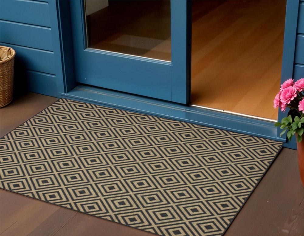 2' X 4' Black and Tan Geometric Stain Resistant Indoor Outdoor Area Rug
