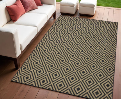 4' X 6' Black and Tan Geometric Stain Resistant Indoor Outdoor Area Rug