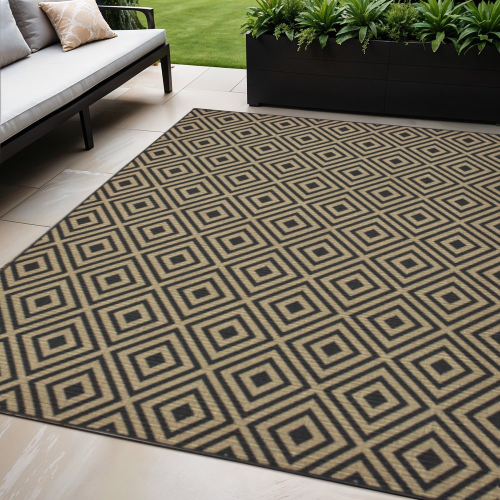 5' X 8' Black and Tan Geometric Stain Resistant Indoor Outdoor Area Rug