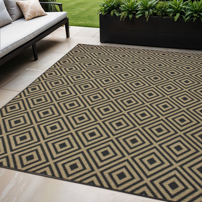 5' X 8' Black and Tan Geometric Stain Resistant Indoor Outdoor Area Rug
