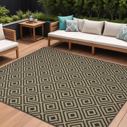 7' X 10' Black and Tan Geometric Stain Resistant Indoor Outdoor Area Rug
