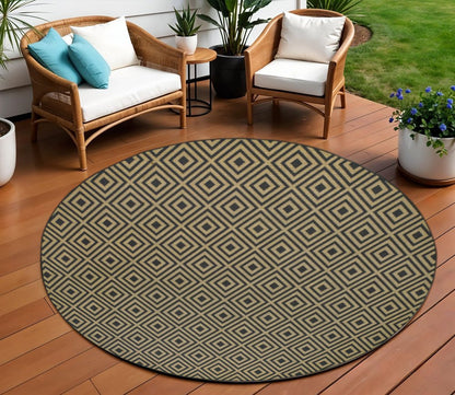 8' X 8' Black and Tan Round Geometric Stain Resistant Indoor Outdoor Area Rug