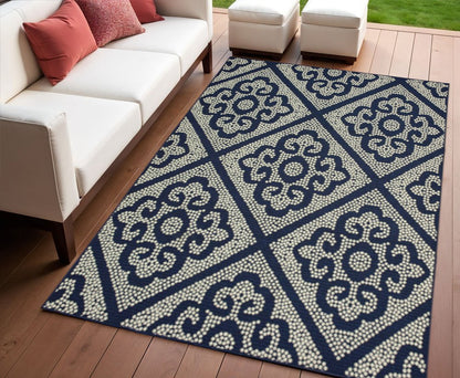 4' X 6' Blue and Ivory Geometric Stain Resistant Indoor Outdoor Area Rug