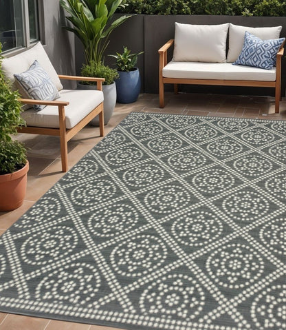 5' X 8' Gray and Ivory Geometric Stain Resistant Indoor Outdoor Area Rug