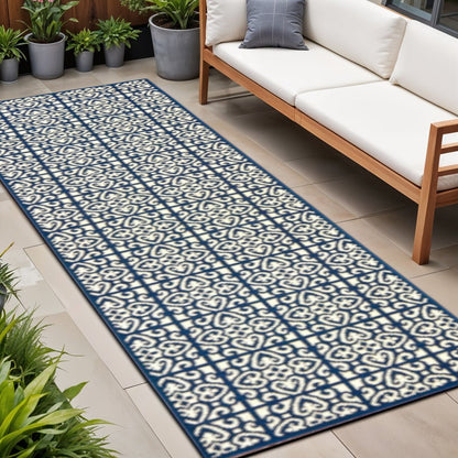 2' X 8' Ivory and Blue Geometric Stain Resistant Indoor Outdoor Area Rug