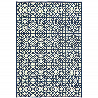 9' X 13' Ivory and Blue Geometric Stain Resistant Indoor Outdoor Area Rug