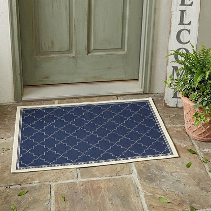 2' X 4' Blue and Ivory Geometric Stain Resistant Indoor Outdoor Area Rug