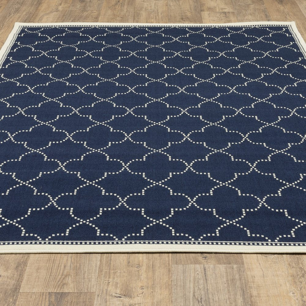 4' X 6' Blue and Ivory Geometric Stain Resistant Indoor Outdoor Area Rug