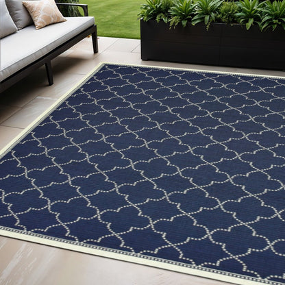5' X 8' Blue and Ivory Geometric Stain Resistant Indoor Outdoor Area Rug