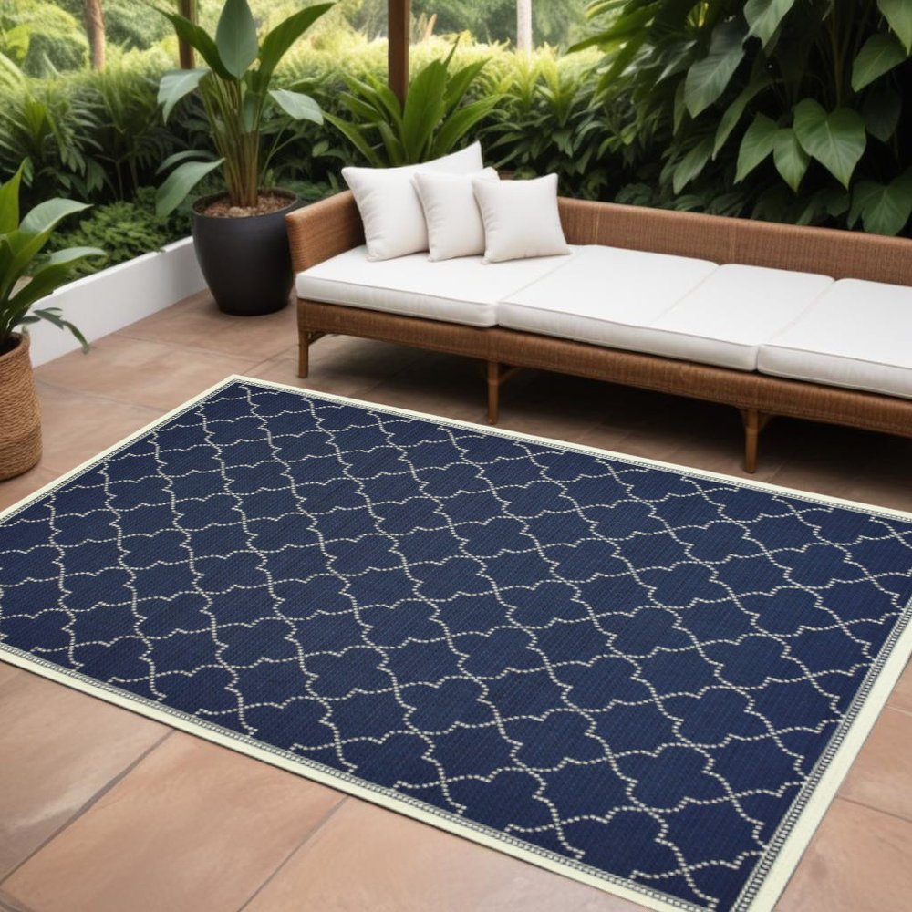 7' X 10' Blue and Ivory Geometric Stain Resistant Indoor Outdoor Area Rug