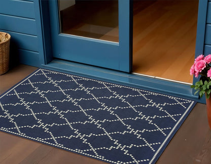 2' X 4' Blue and Ivory Geometric Stain Resistant Indoor Outdoor Area Rug