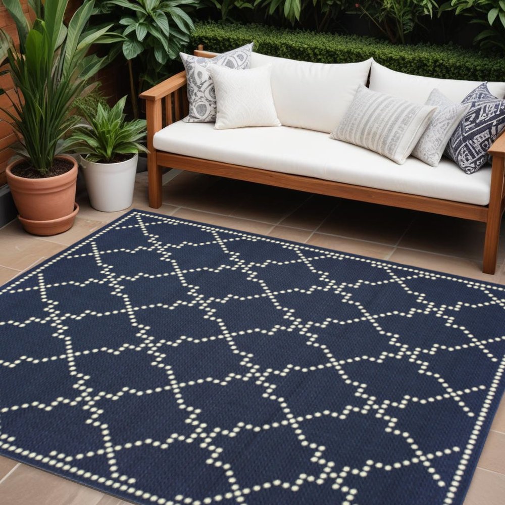 7' X 10' Blue and Ivory Geometric Stain Resistant Indoor Outdoor Area Rug