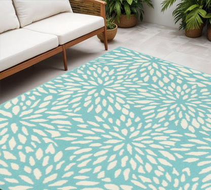 5' X 8' Blue and Ivory Floral Stain Resistant Indoor Outdoor Area Rug