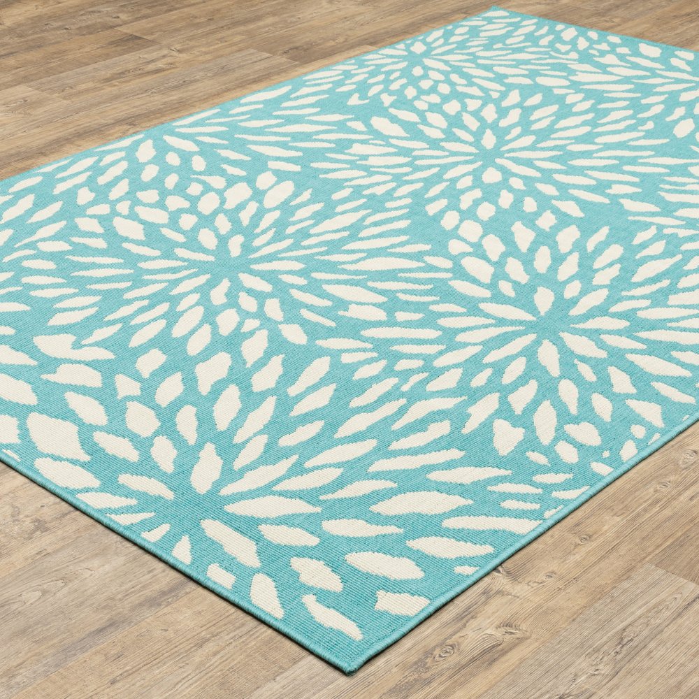 9' X 13' Blue and Ivory Floral Stain Resistant Indoor Outdoor Area Rug