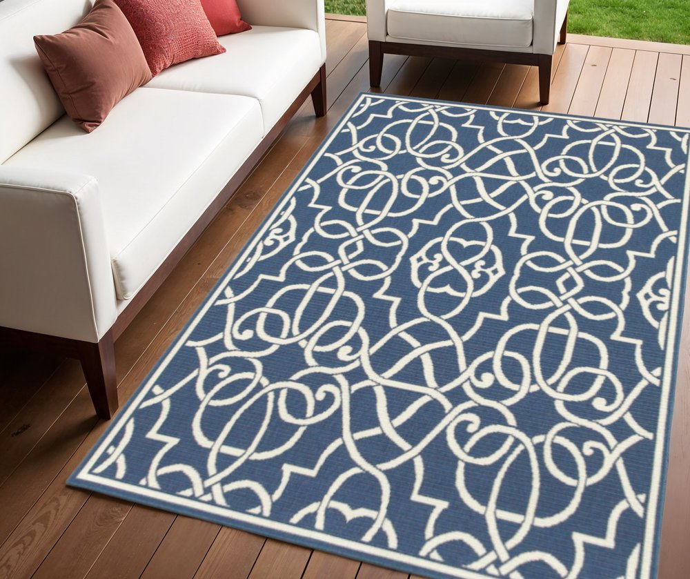 4' X 6' Blue and Ivory Geometric Stain Resistant Indoor Outdoor Area Rug