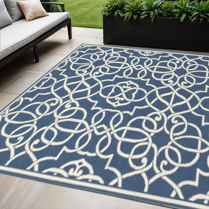 5' X 8' Blue and Ivory Geometric Stain Resistant Indoor Outdoor Area Rug