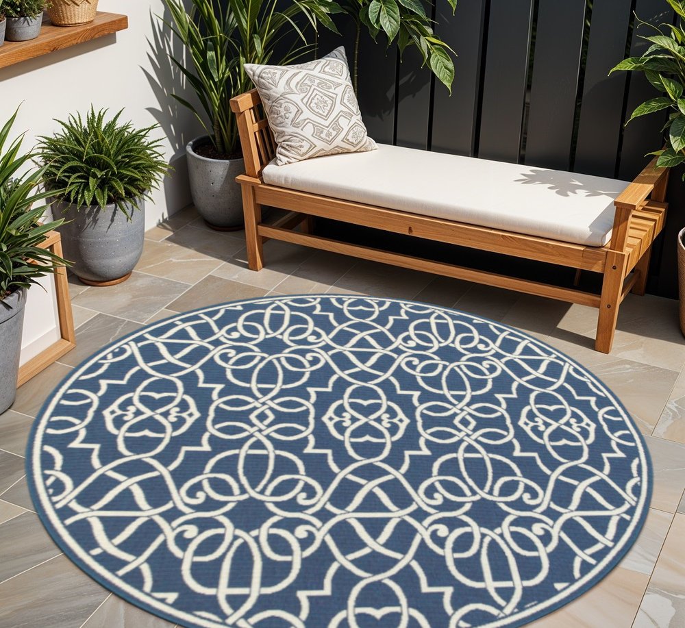 8' X 8' Blue and Ivory Round Geometric Stain Resistant Indoor Outdoor Area Rug