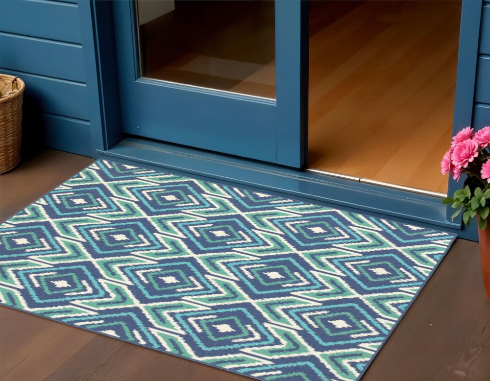 2' X 3' Blue and Ivory Geometric Stain Resistant Indoor Outdoor Area Rug