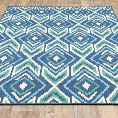 5' X 8' Blue and Ivory Geometric Stain Resistant Indoor Outdoor Area Rug