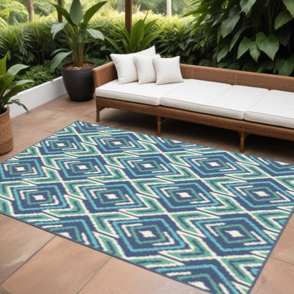 9' X 13' Blue and Ivory Geometric Stain Resistant Indoor Outdoor Area Rug