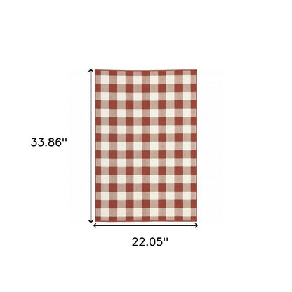 2' X 3' Red And Ivory Geometric Plaid Indoor Outdoor Area Rug