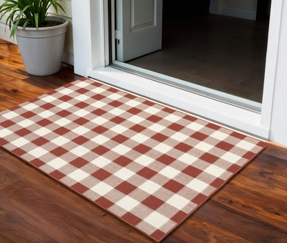 2' X 3' Red And Ivory Geometric Plaid Indoor Outdoor Area Rug