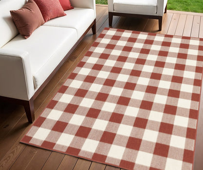 4' X 6' Red and Ivory Geometric Stain Resistant Indoor Outdoor Area Rug