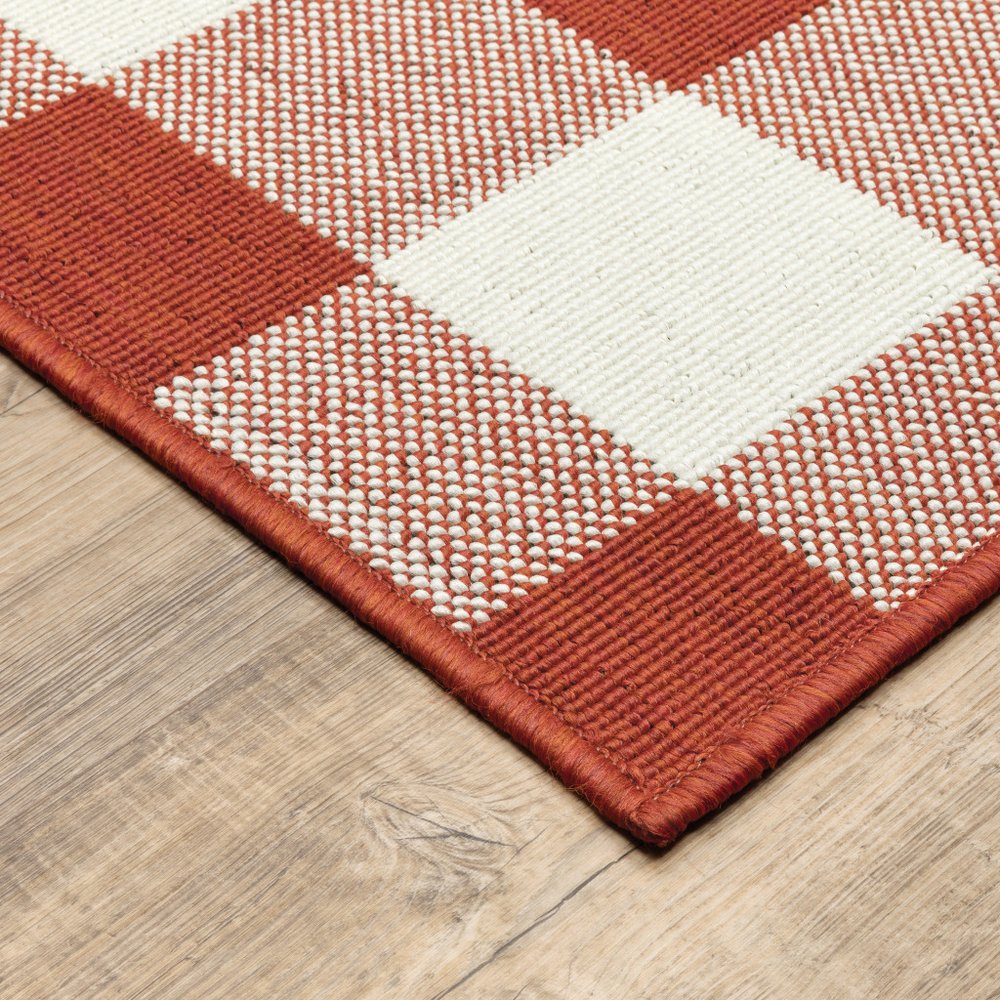 7' X 10' Red and Ivory Geometric Stain Resistant Indoor Outdoor Area Rug