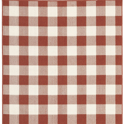 7' X 10' Red and Ivory Geometric Stain Resistant Indoor Outdoor Area Rug