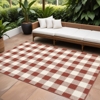 7' X 10' Red and Ivory Geometric Stain Resistant Indoor Outdoor Area Rug