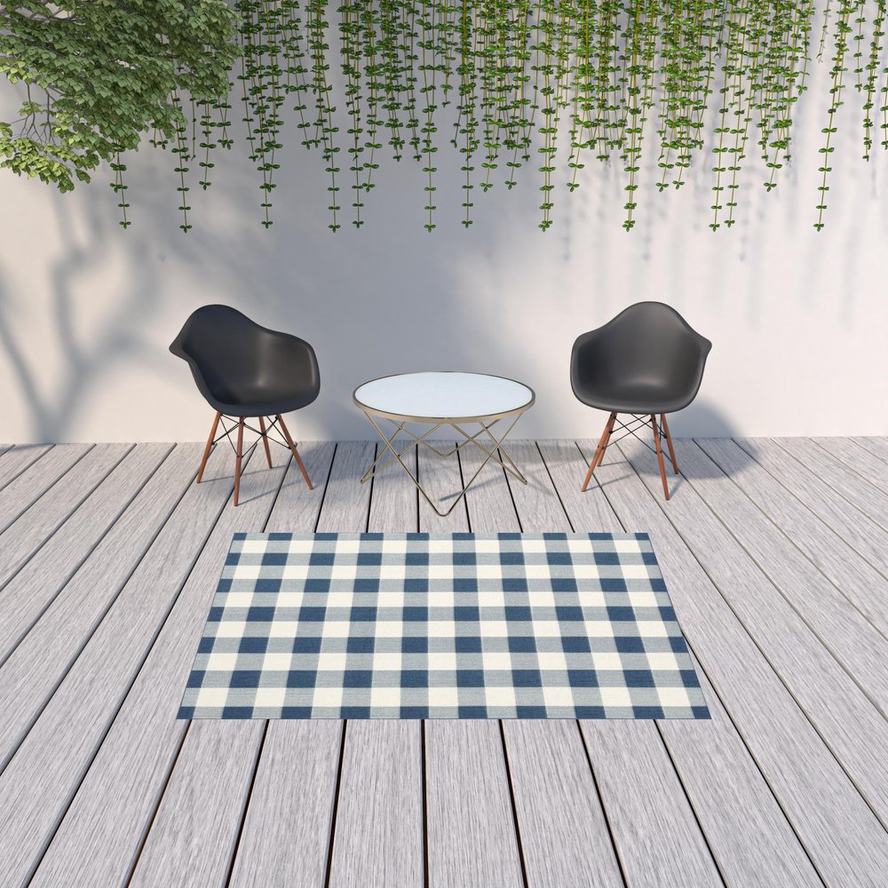 5' X 8' Blue and Ivory Geometric Stain Resistant Indoor Outdoor Area Rug