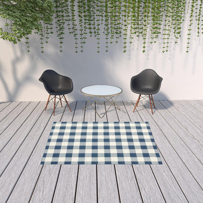 5' X 8' Blue and Ivory Geometric Stain Resistant Indoor Outdoor Area Rug