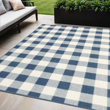 5' X 8' Blue and Ivory Geometric Stain Resistant Indoor Outdoor Area Rug