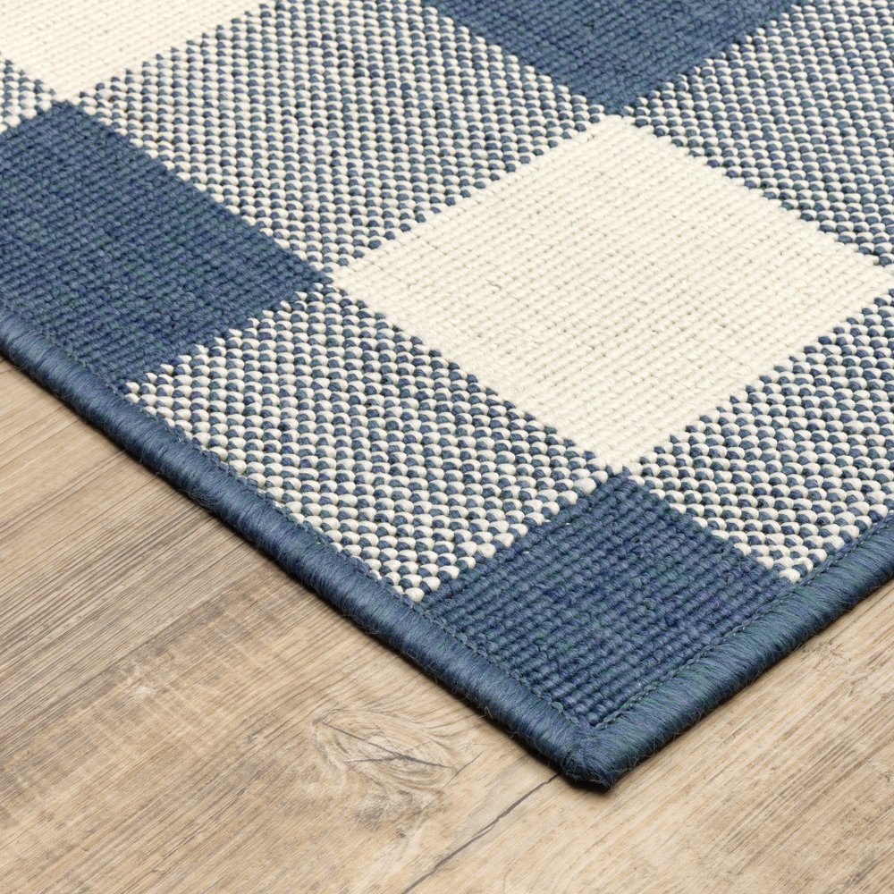5' X 8' Blue and Ivory Geometric Stain Resistant Indoor Outdoor Area Rug