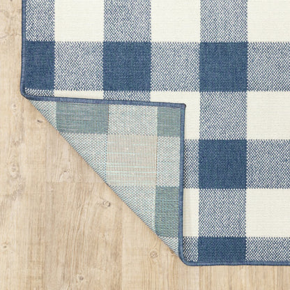 5' X 8' Blue and Ivory Geometric Stain Resistant Indoor Outdoor Area Rug