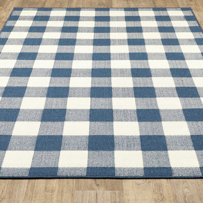 5' X 8' Blue and Ivory Geometric Stain Resistant Indoor Outdoor Area Rug