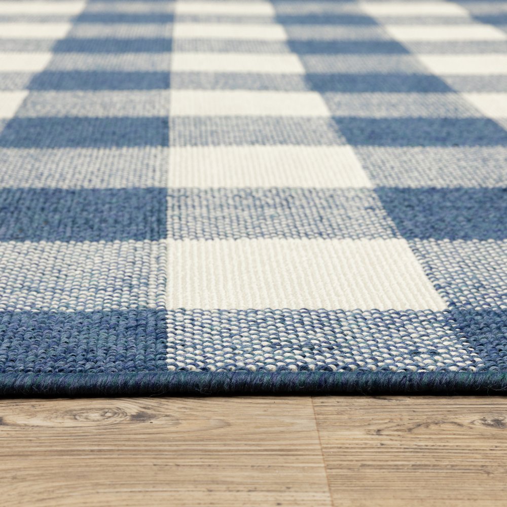 7' X 10' Blue and Ivory Geometric Stain Resistant Indoor Outdoor Area Rug