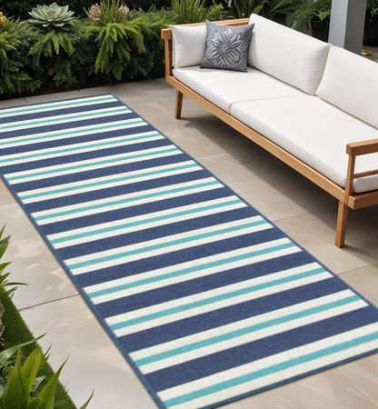 2' X 8' Blue and Ivory Geometric Stain Resistant Indoor Outdoor Area Rug