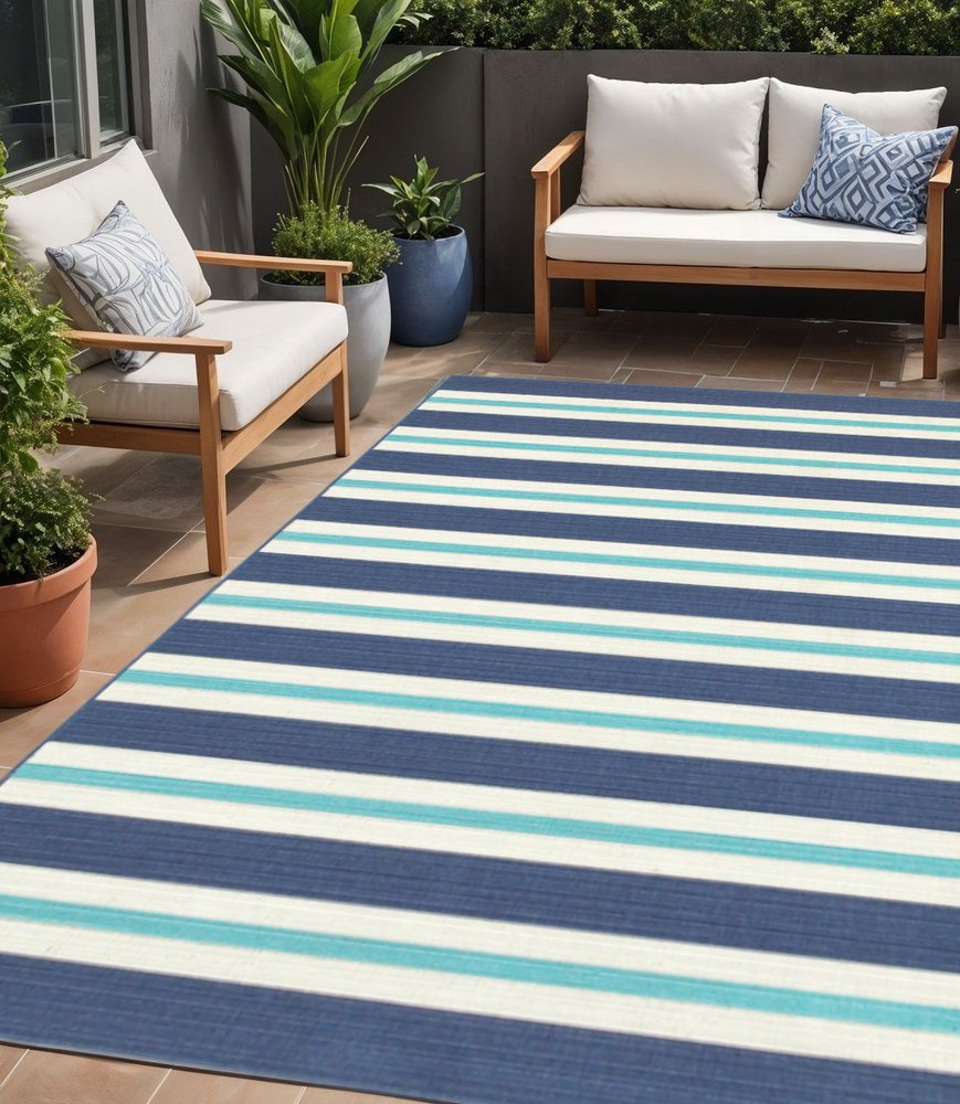 5' X 8' Blue and Ivory Geometric Stain Resistant Indoor Outdoor Area Rug