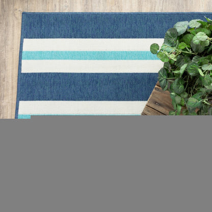 5' X 8' Blue and Ivory Geometric Stain Resistant Indoor Outdoor Area Rug