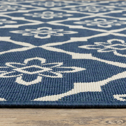 4' X 6' Blue and Ivory Floral Stain Resistant Indoor Outdoor Area Rug