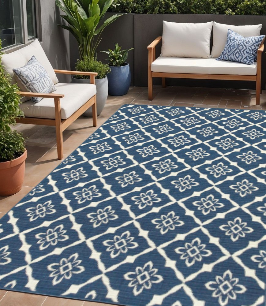 5' X 8' Blue and Ivory Floral Stain Resistant Indoor Outdoor Area Rug