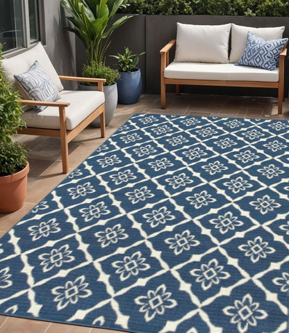 5' X 8' Blue and Ivory Floral Stain Resistant Indoor Outdoor Area Rug